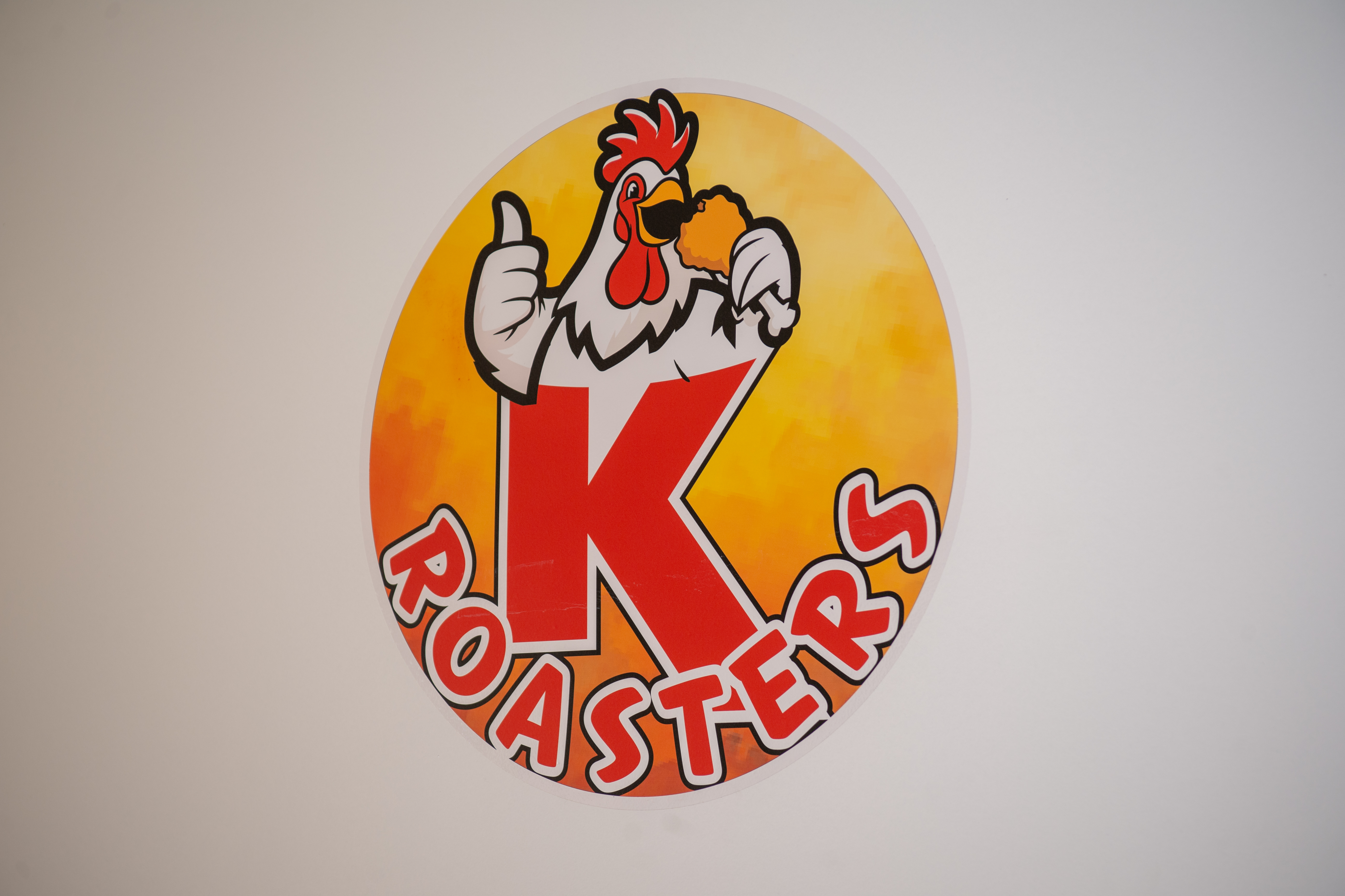 Professional photo of the Restaurant Brand Image located in the storefront of K Roasters.